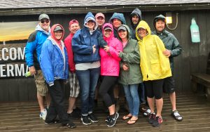 A group of people in raincoats.
